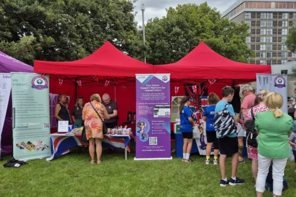 Promotional graphic from Improving Lives Plymouth announcing their recognition as a VALOUR-recognised centre. The image features the organization's circular purple logo with the tagline "Supporting people since 1907" in the upper left, bold navy text reading "VALOUR," and diagonal stripes in navy blue, red, white, and light blue reminiscent of military or patriotic imagery on the right side.